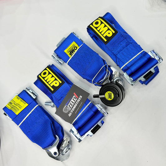 Red OMP racing harness with 3-inch nylon straps for motorsport safety