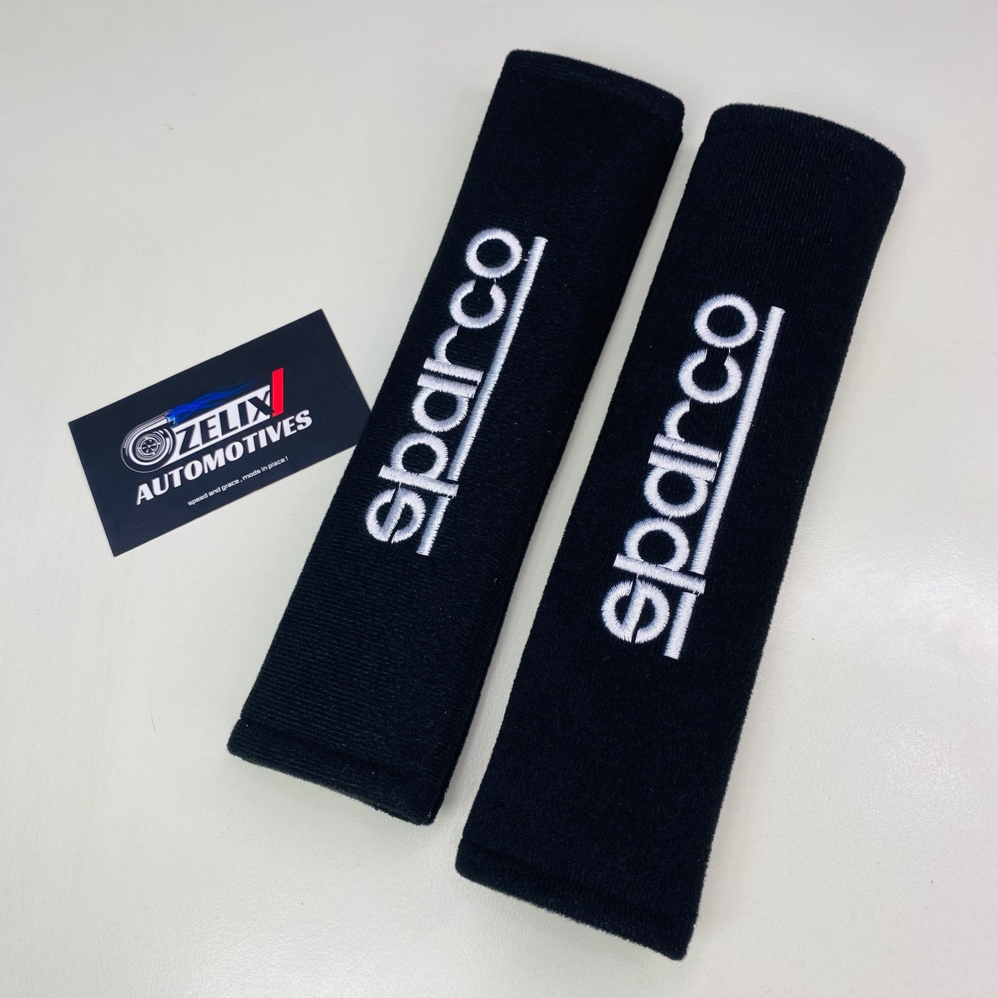 Sparco seat belt shoulder pads in premium Black