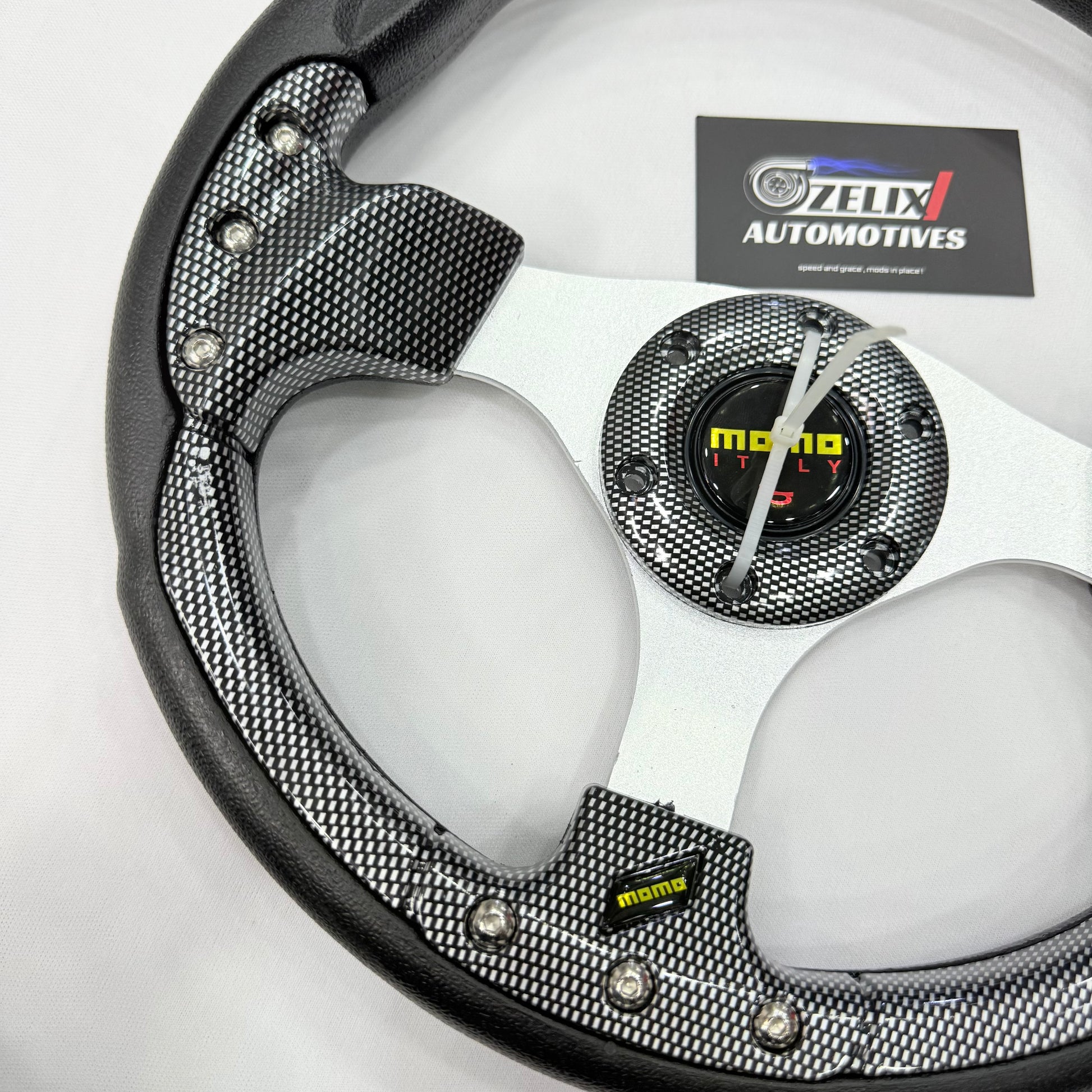 MOMO round steering wheel in Carbon color