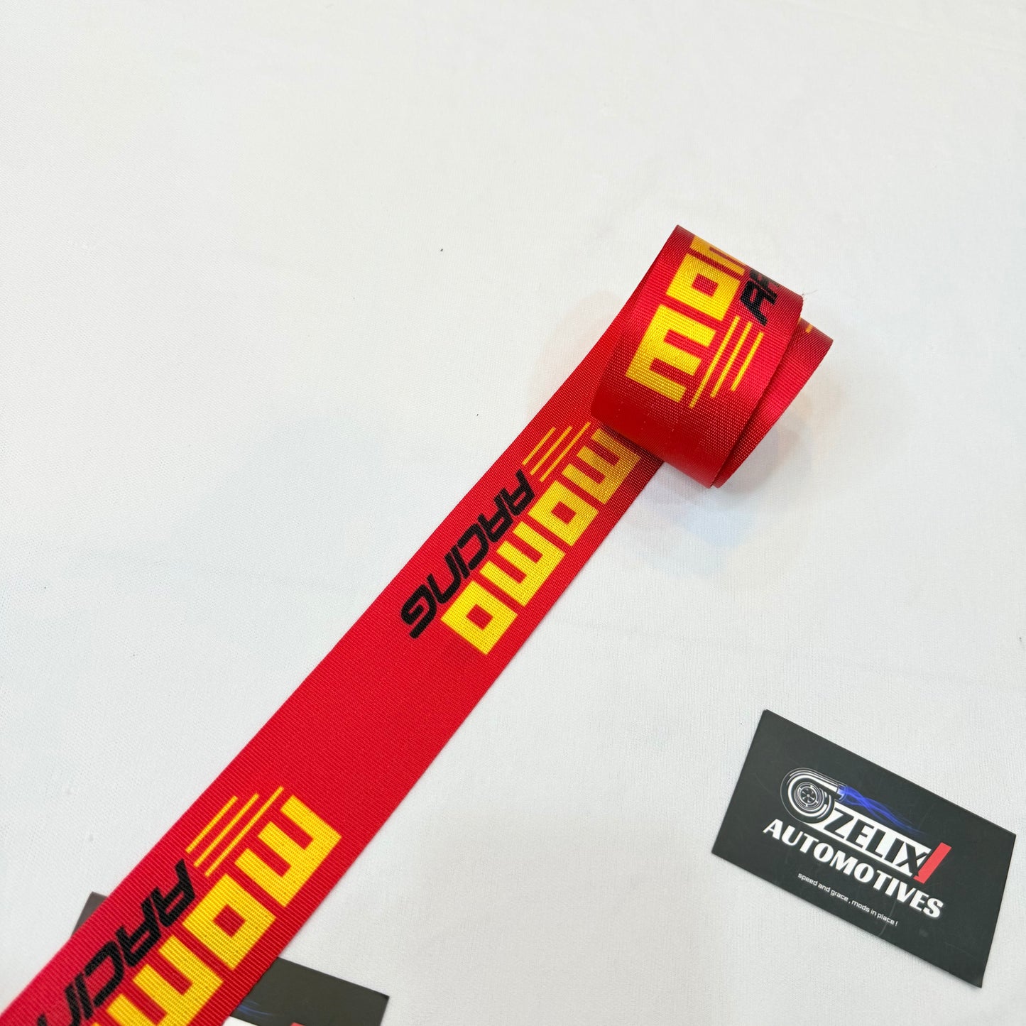Aftermarket car seat belt in Red
