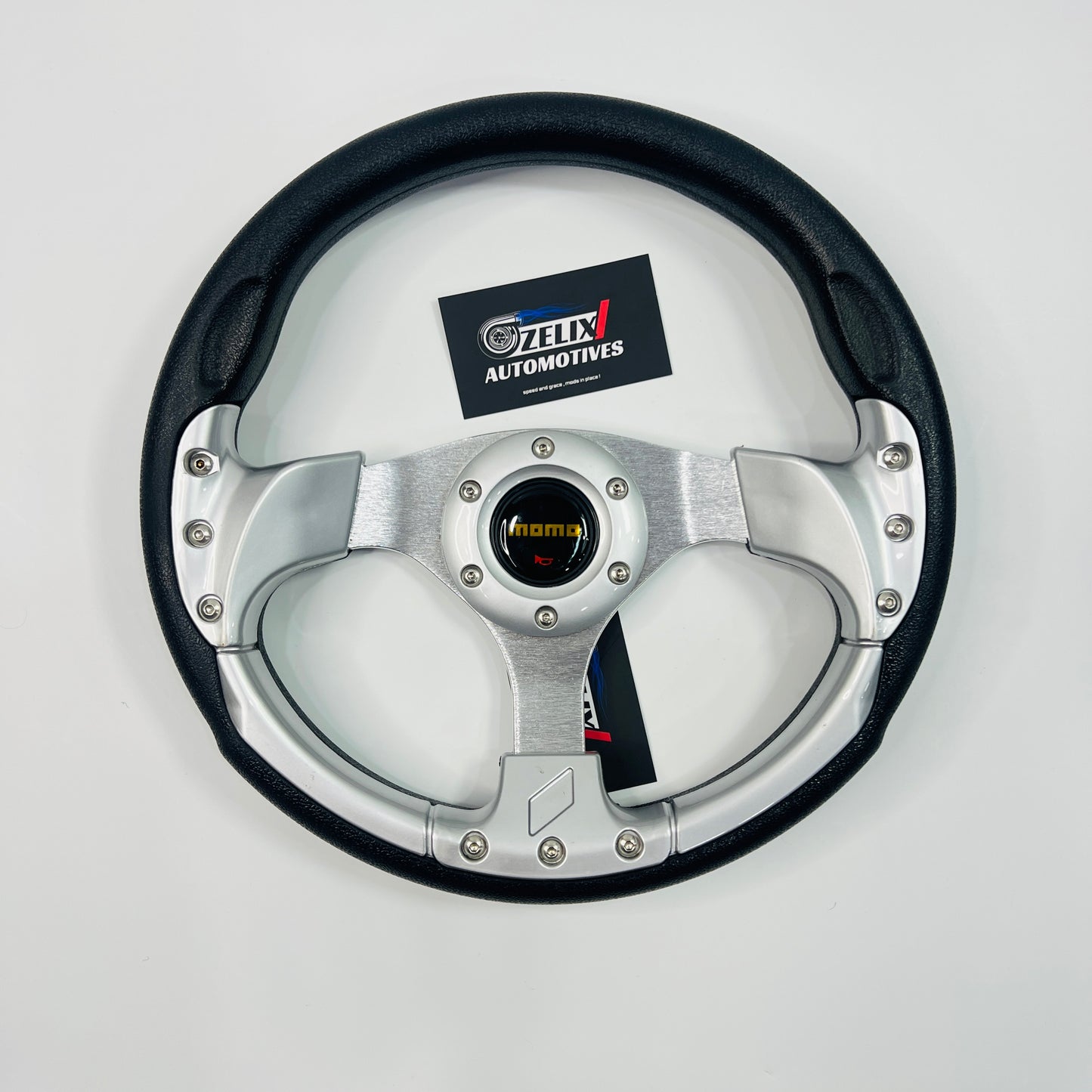 MOMO racing-style steering wheel in silver