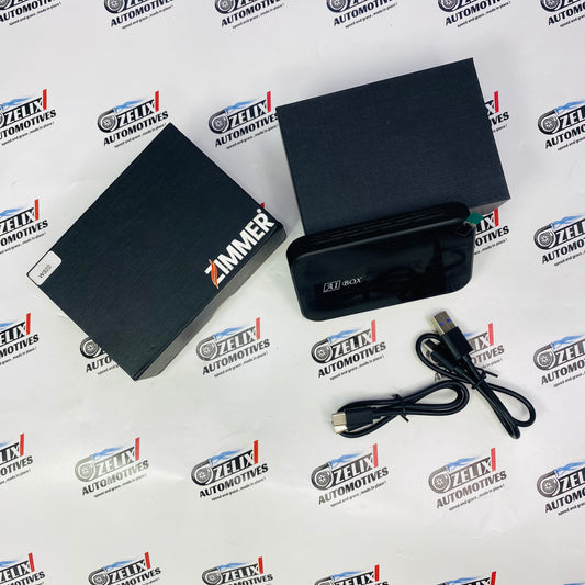 Zimmer AI Box Android AI multimedia adapter for wireless Apple CarPlay and Android Auto with box and USB cable.