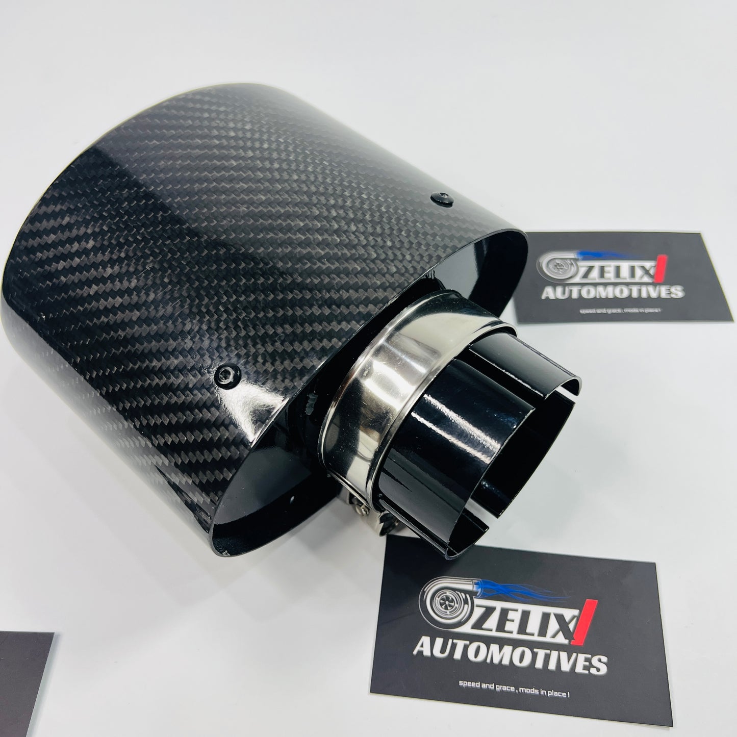Top-down view emphasizing the oval oversized outlet and glossy finish