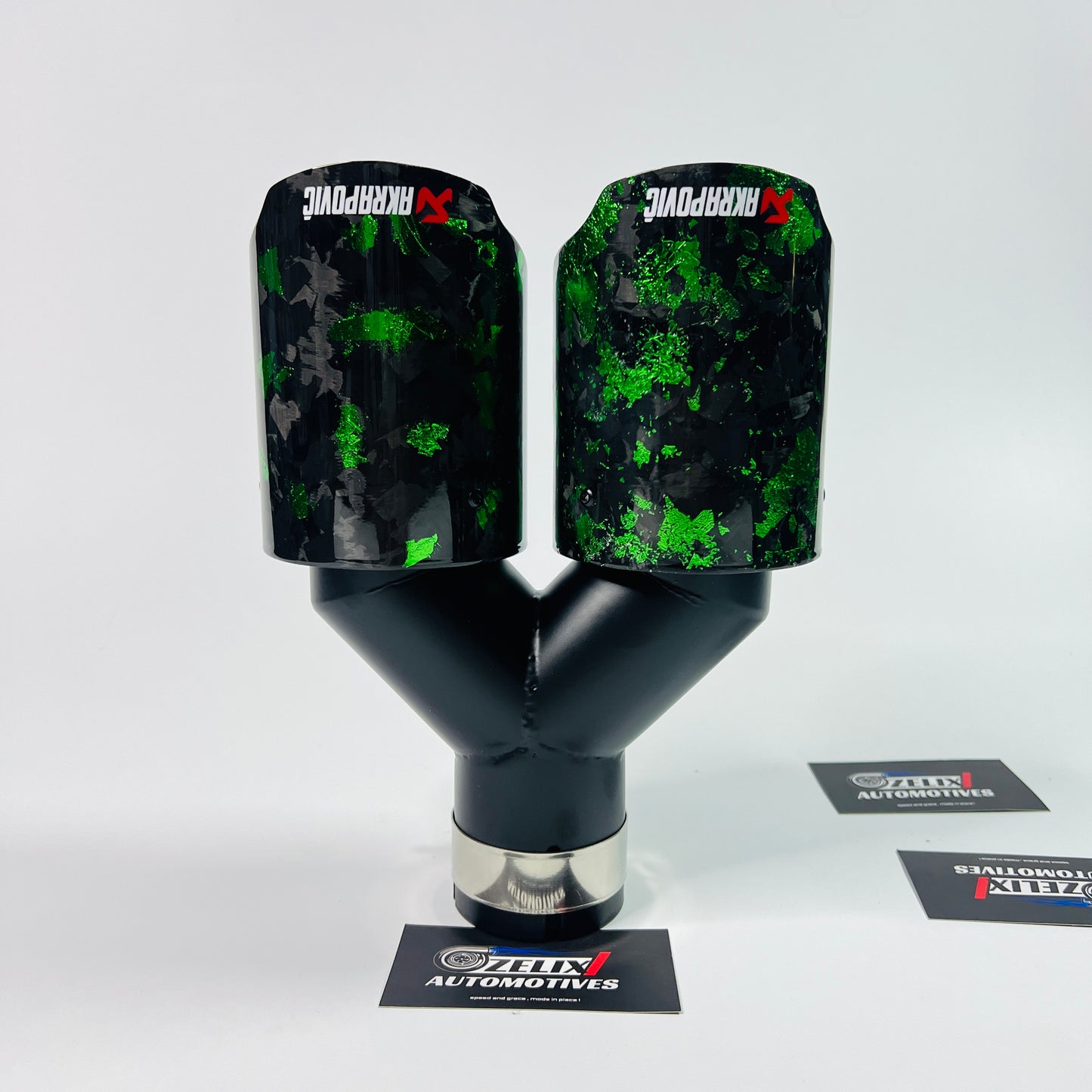 Close-up detailing the green forged carbon flakes and glossy clear coat