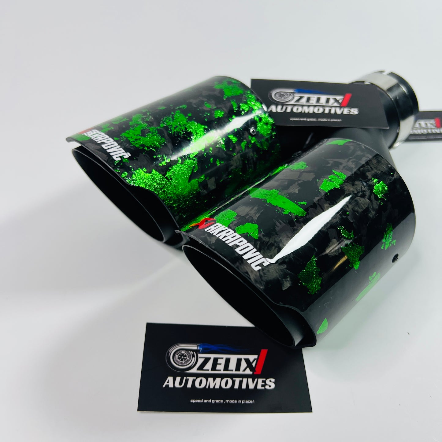 Top-down view showcasing the vibrant green carbon pattern and dual outlets