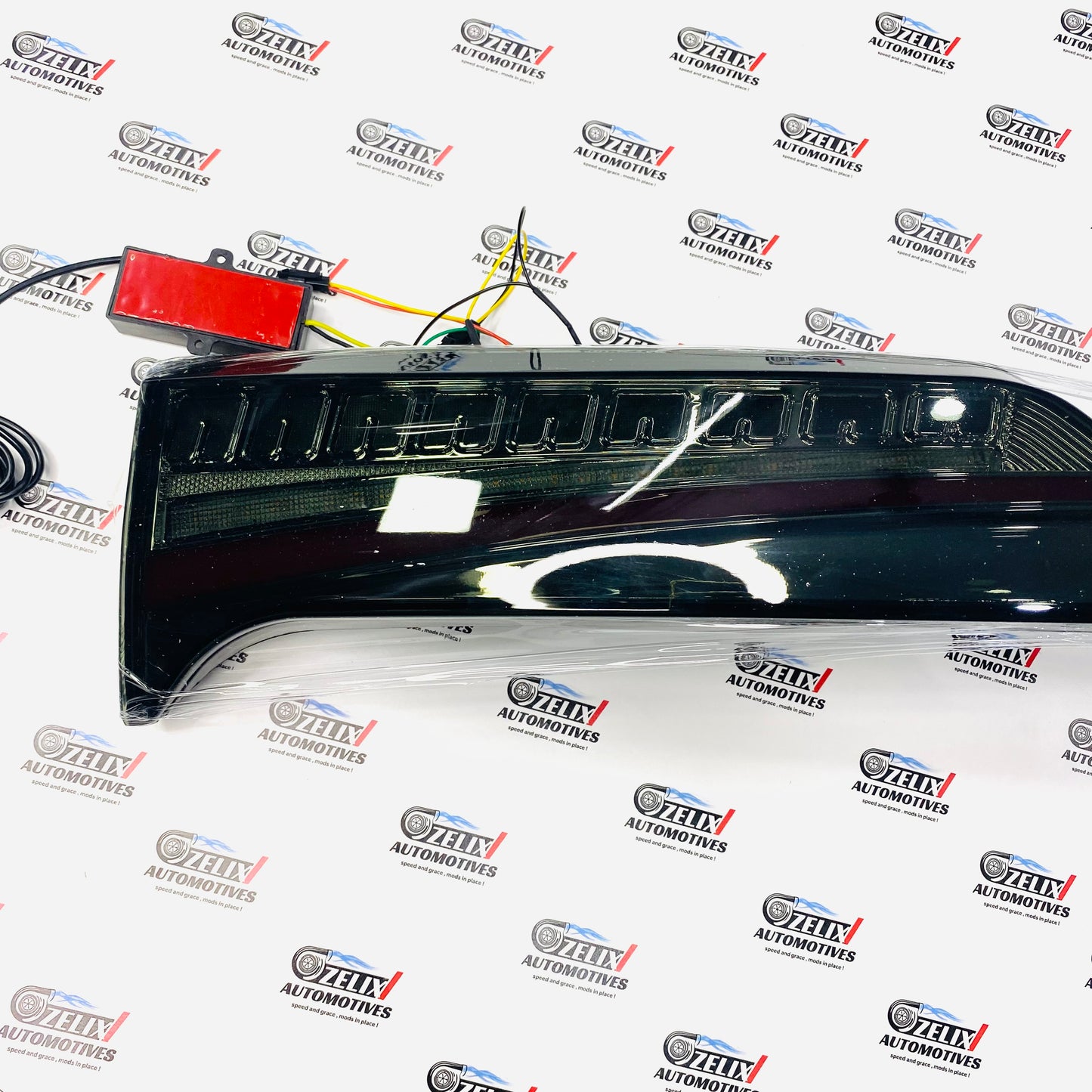 Fortuner aftermarket tail lamps in smoke and red finish for 2016 models