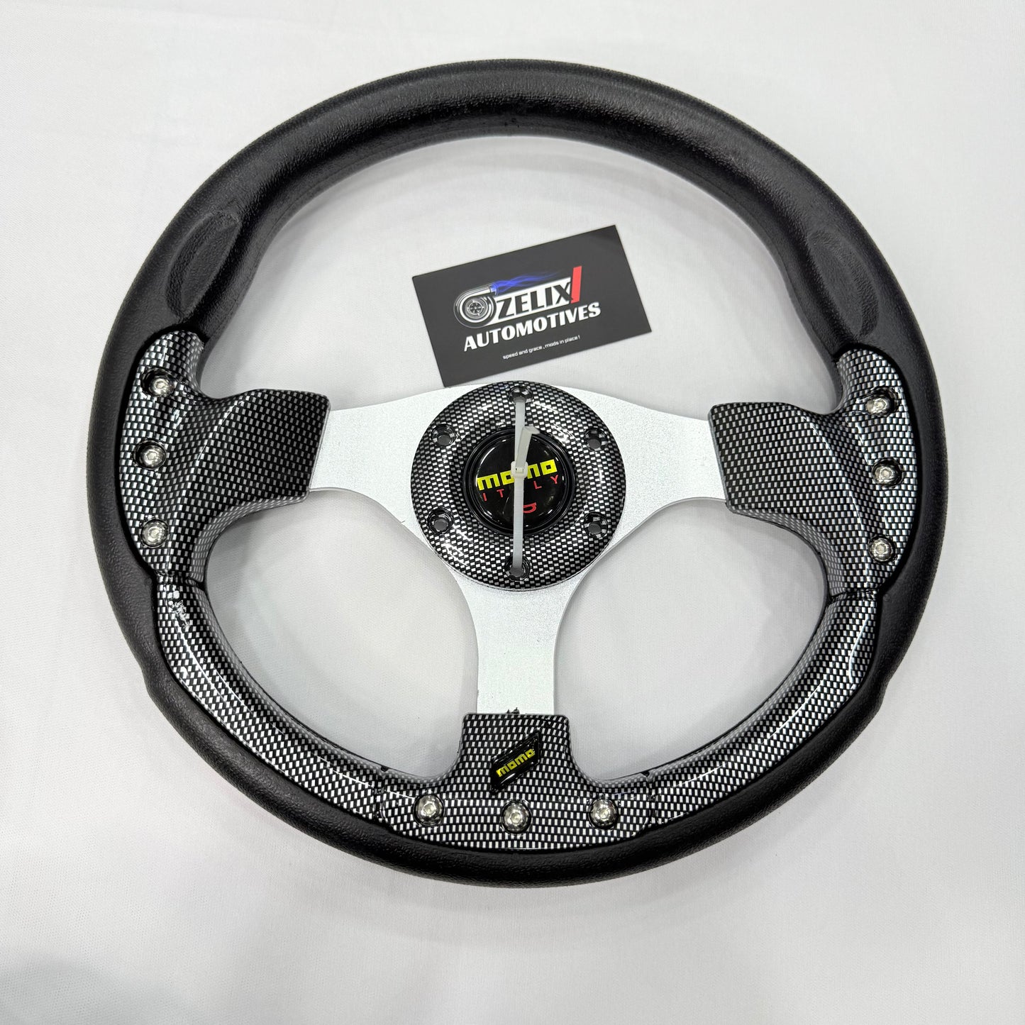 MOMO round steering wheel in  Carbon color