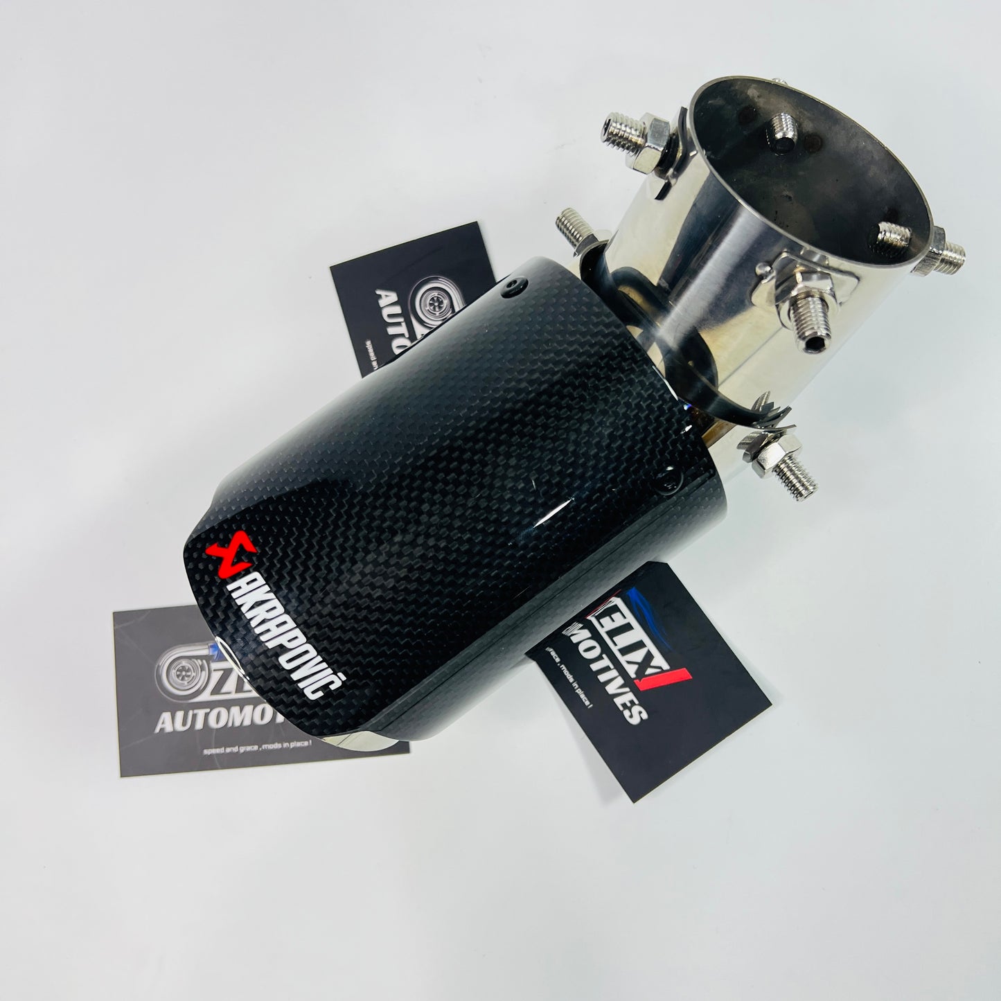Angle-adjustable Akrapovic single exhaust tip in glossy carbon