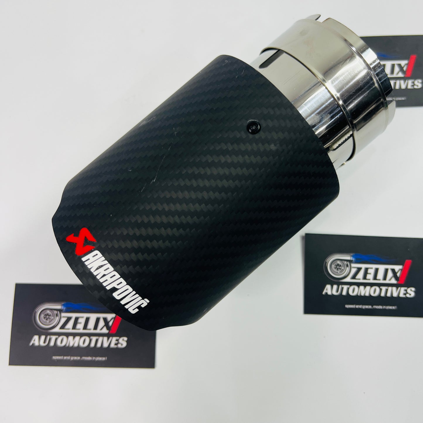 Top view of Akrapovic matte carbon single exhaust tip