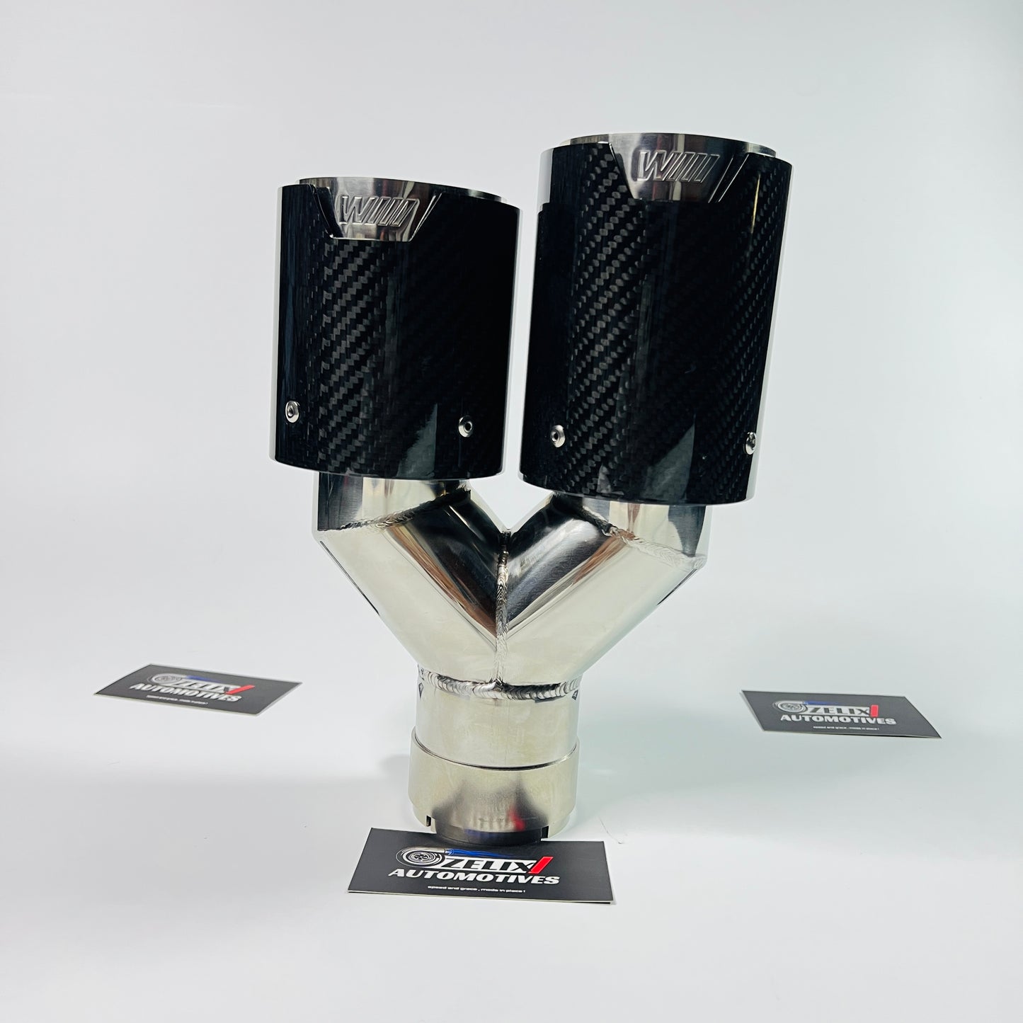 Bevel edge close-up of M Style dual exhaust tips