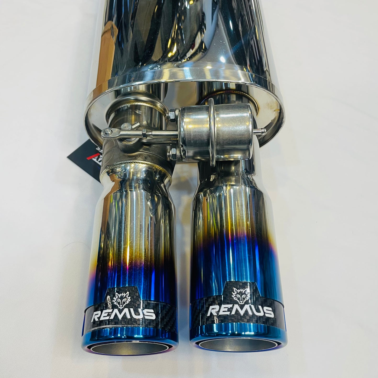 Close-up of burnt carbon titanium dual tips