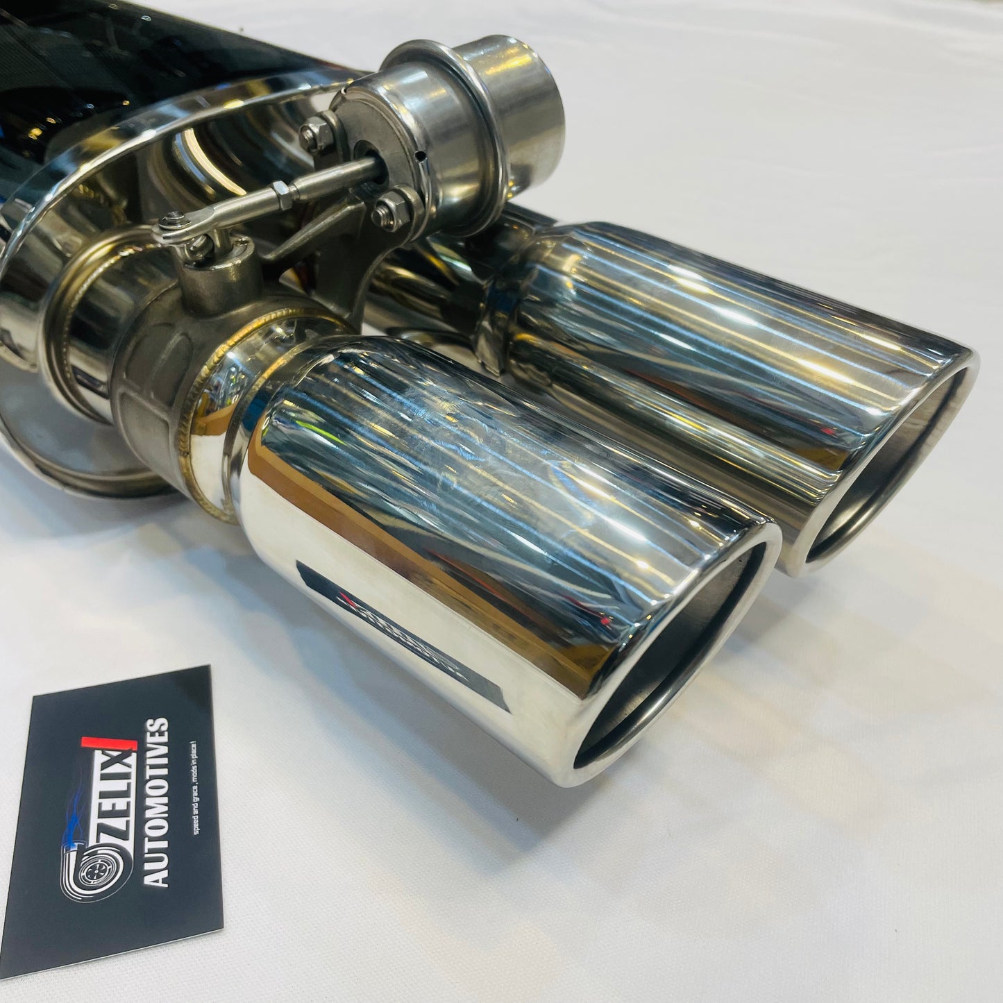 Bevel edge detail on Remus Valvetronic dual-tip exhaust
