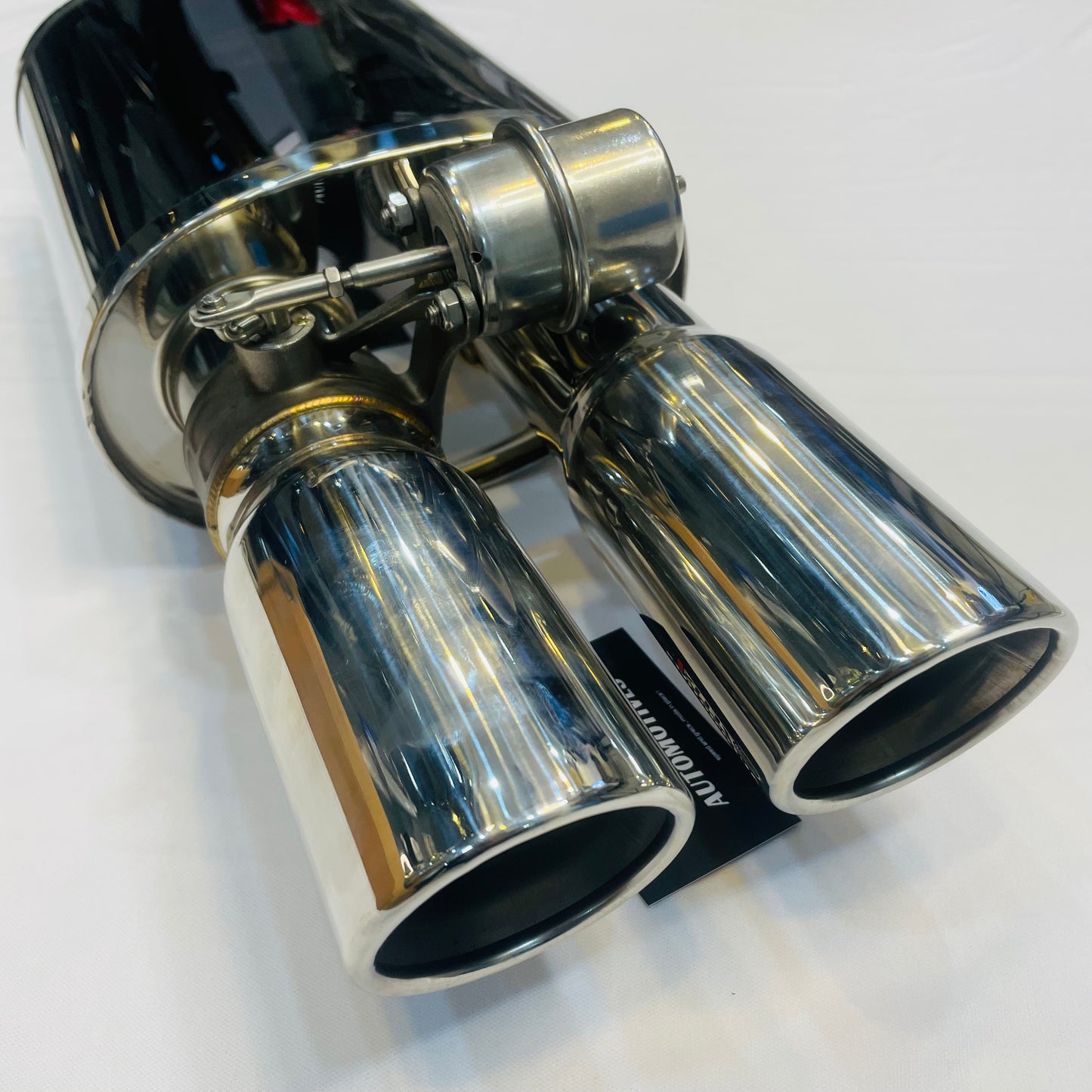 Rear-focused view of Remus Valvetronic dual-tip exhaust