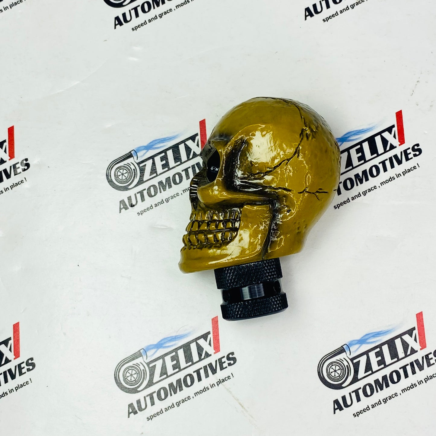 cracked golden skull design