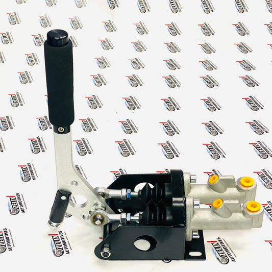 TwinLock dual master cylinder hydraulic handbrake with silver handle and black steel base for aftermarket drift and rally performance.