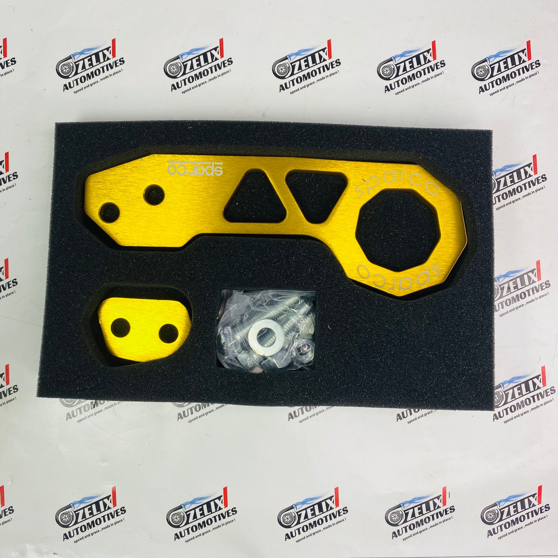 Rear tow hook installed on car in Yellow color 