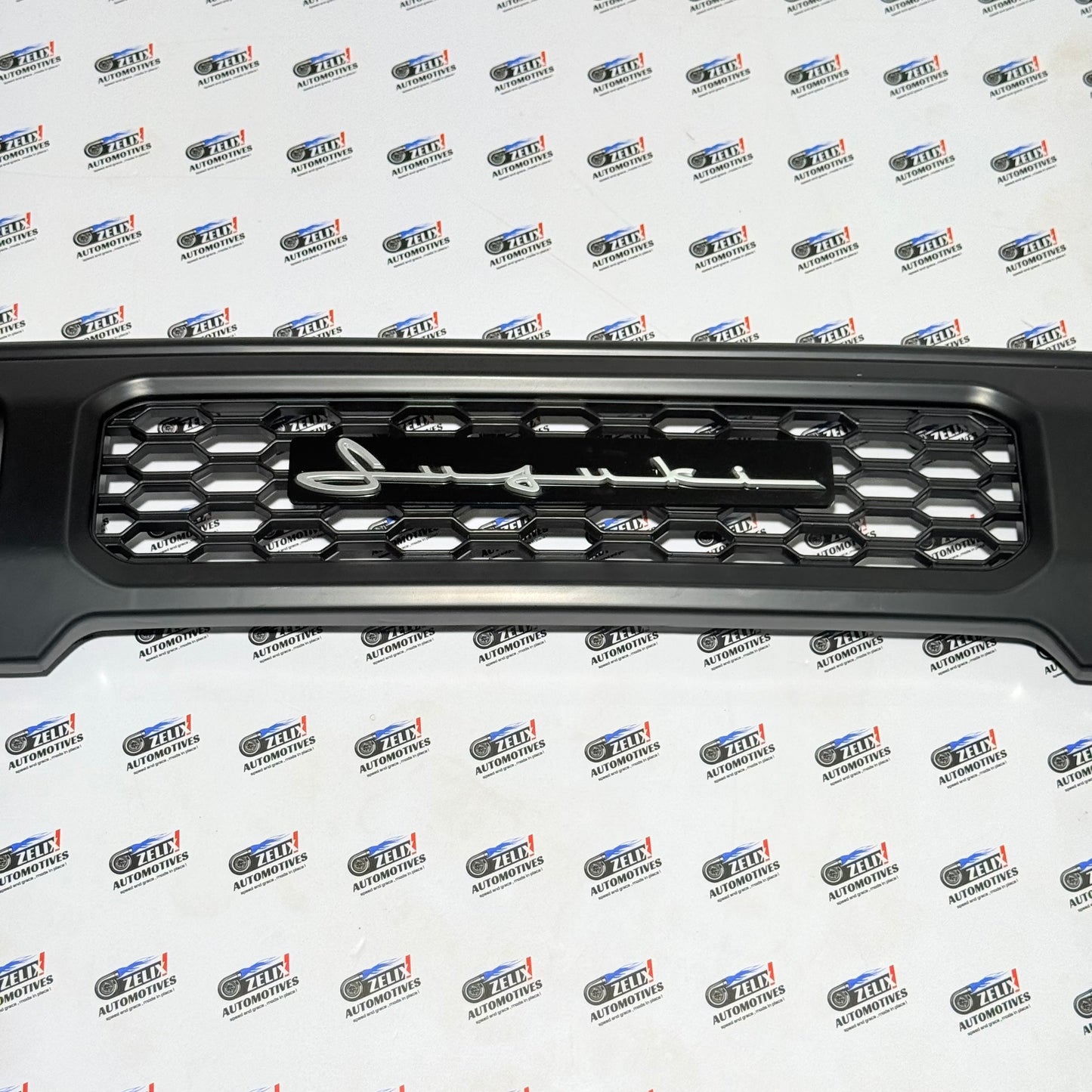Honeycomb Style Front Grille with Cursive Logo for Suzuki Jimny (All Models)