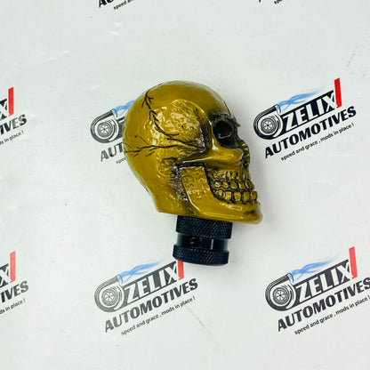 cracked golden skull design