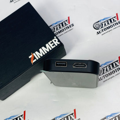 Wireless Zimmer AI Box plug-and-play Android AI adapter with packaging and USB cable included.