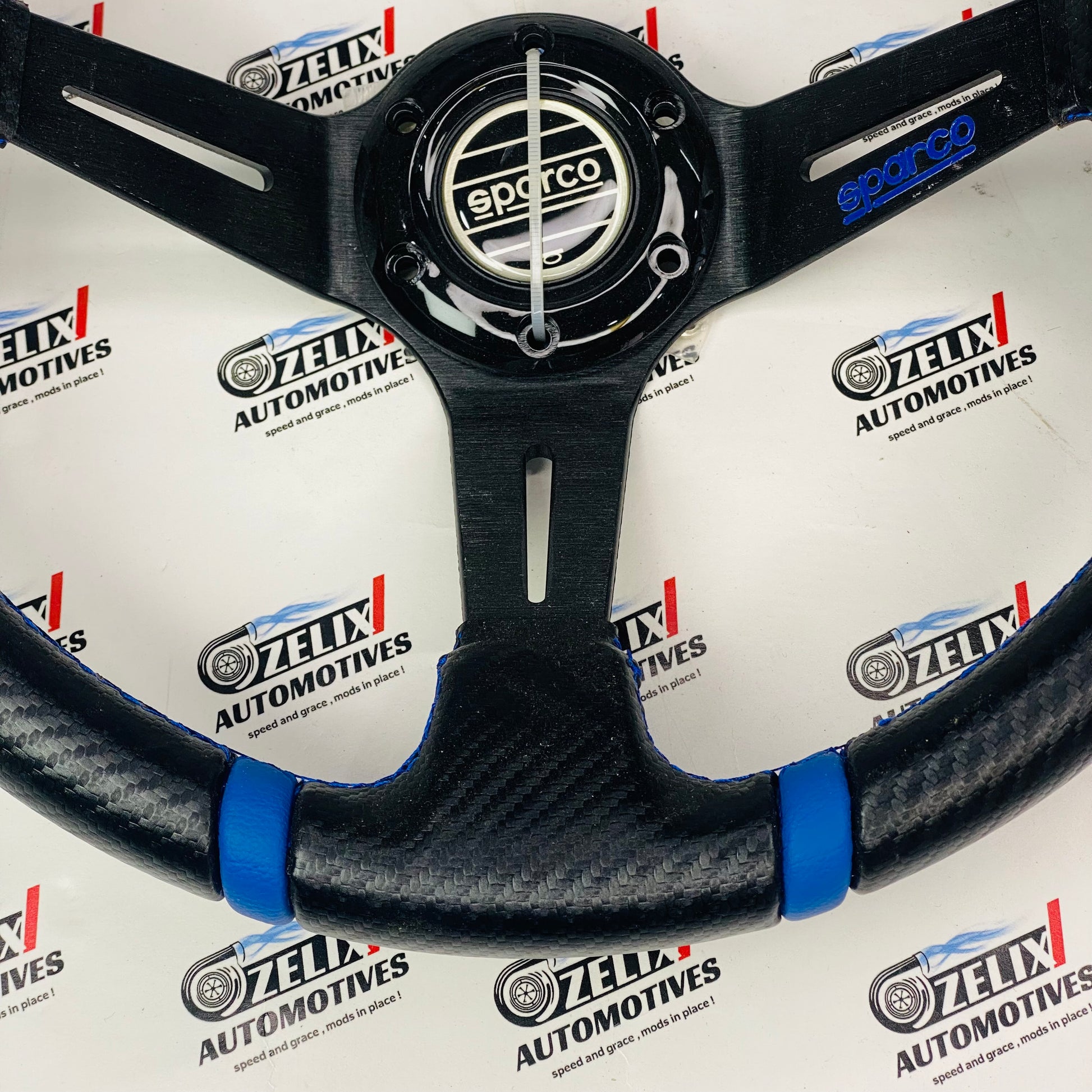 Sparco carbon fiber style steering wheel in Blue 