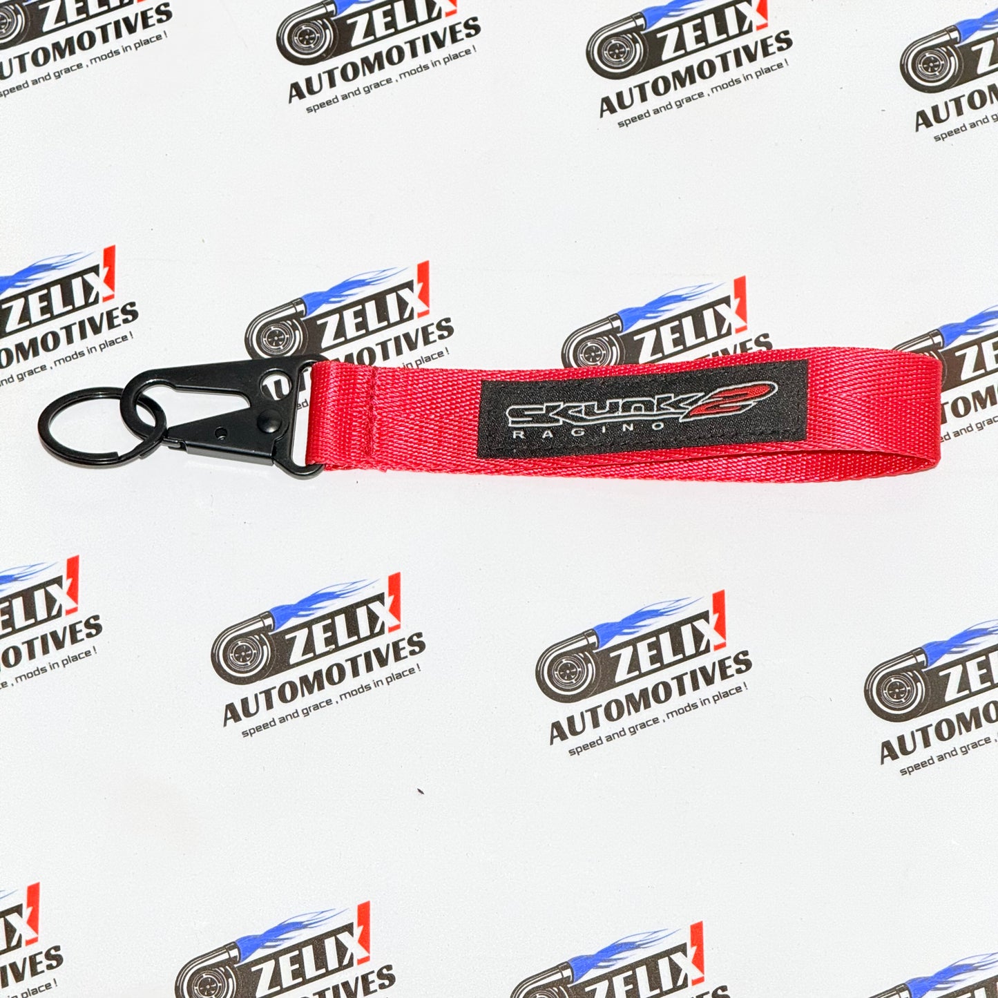 Skunk Racing Style Keychain Strap | Red Edition