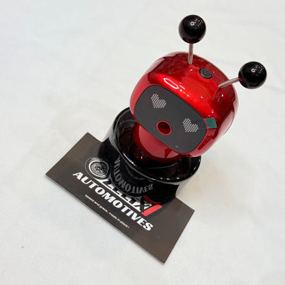 Robot-style car dashboard perfume in Red