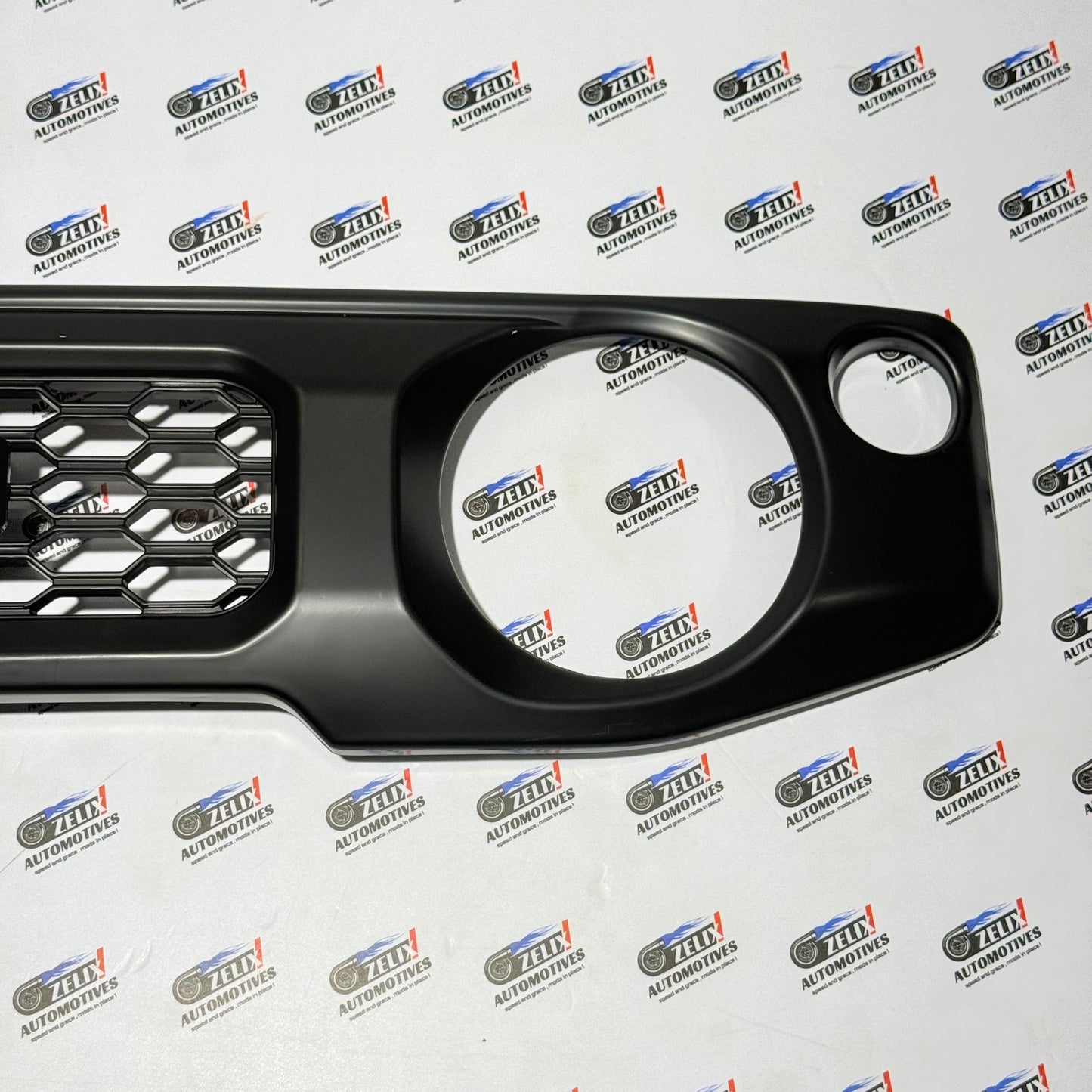 Honeycomb Style Front Grille with Cursive Logo for Suzuki Jimny (All Models)