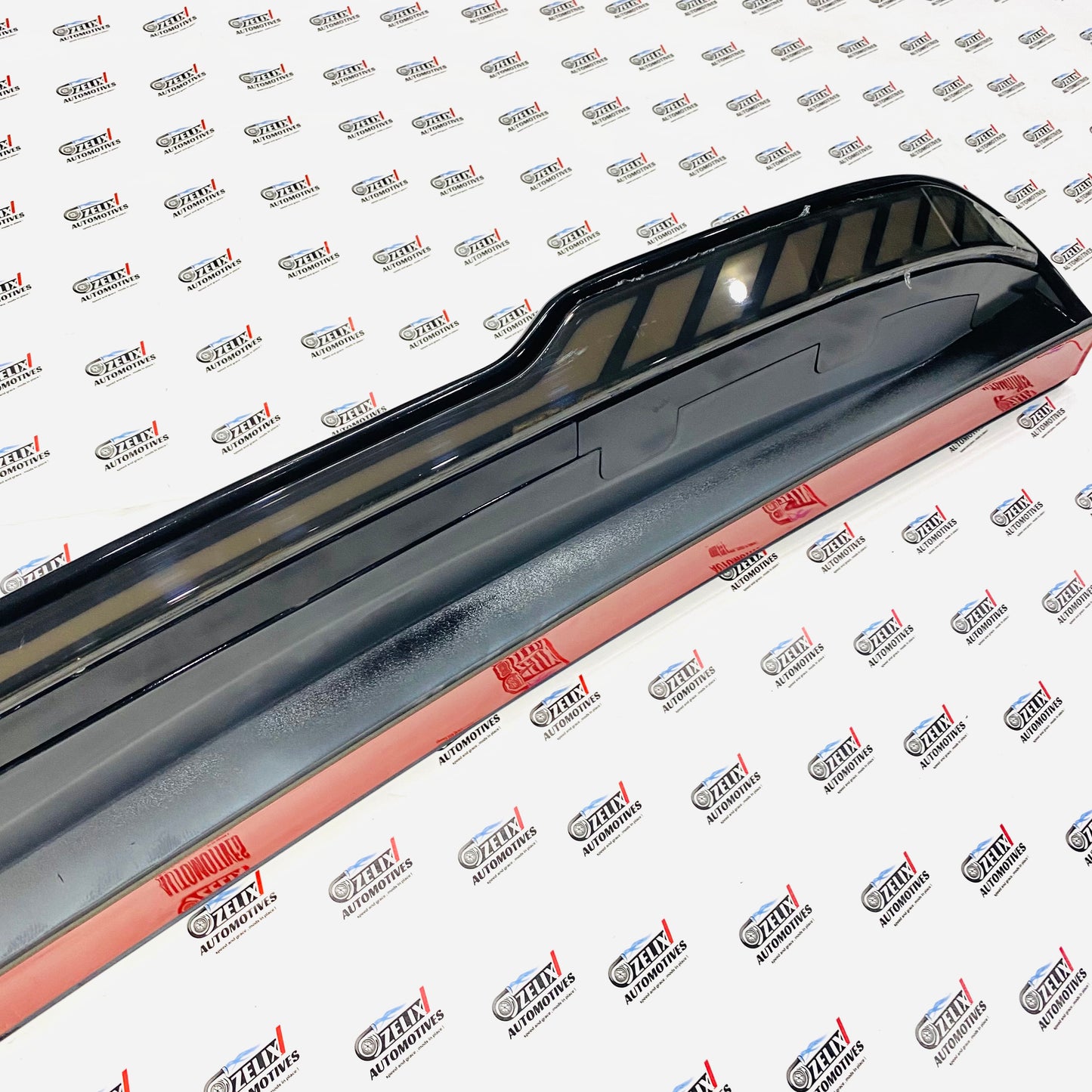 Aftermarket Thar Roxx rear spoiler in black Color 