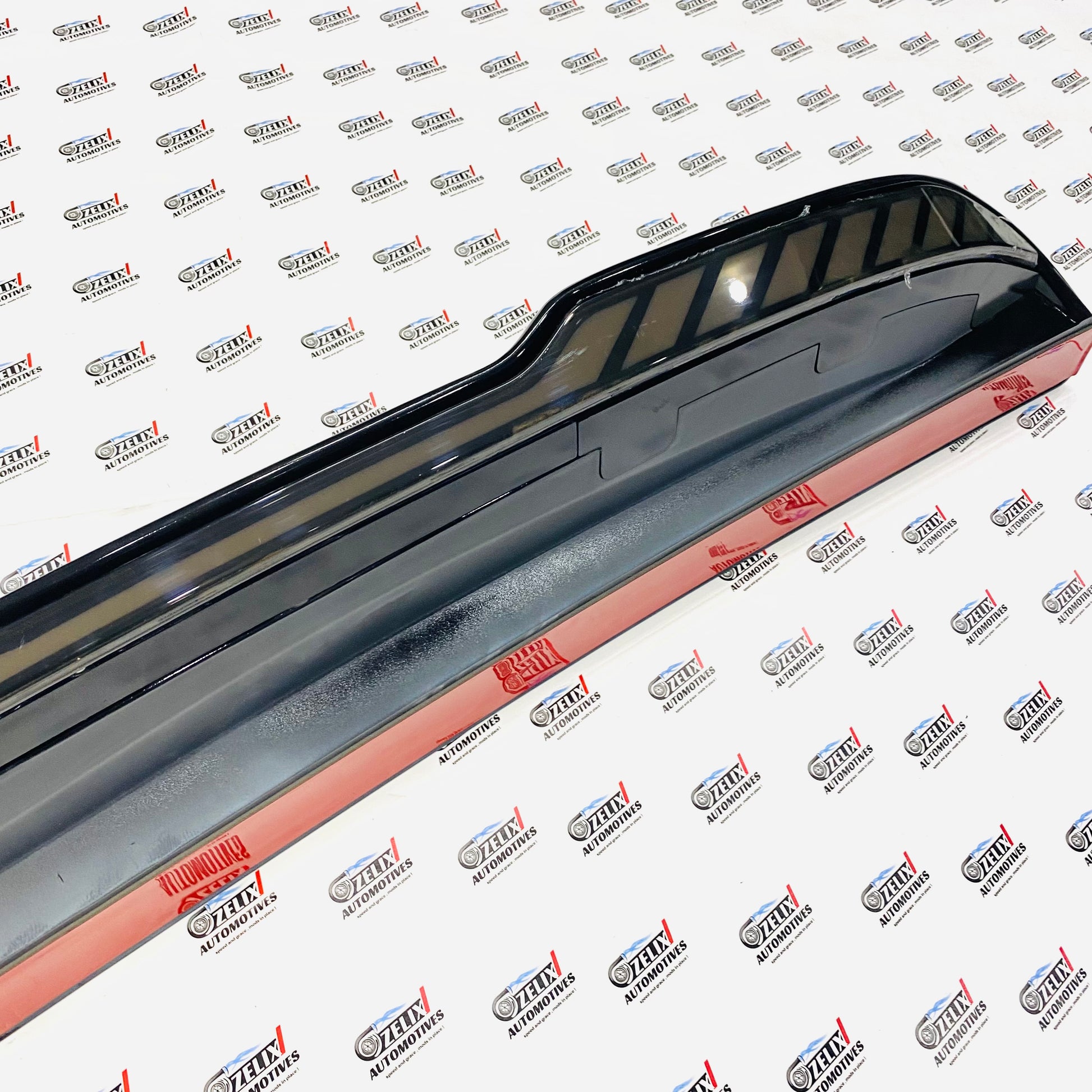 Aftermarket Thar Roxx rear spoiler in black Color 