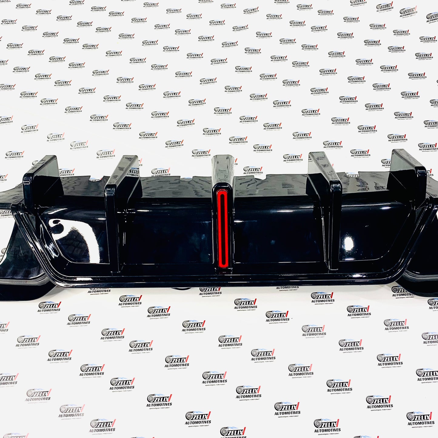 aftermarket BMW G28 B Style rear bumper diffuser in Black color 