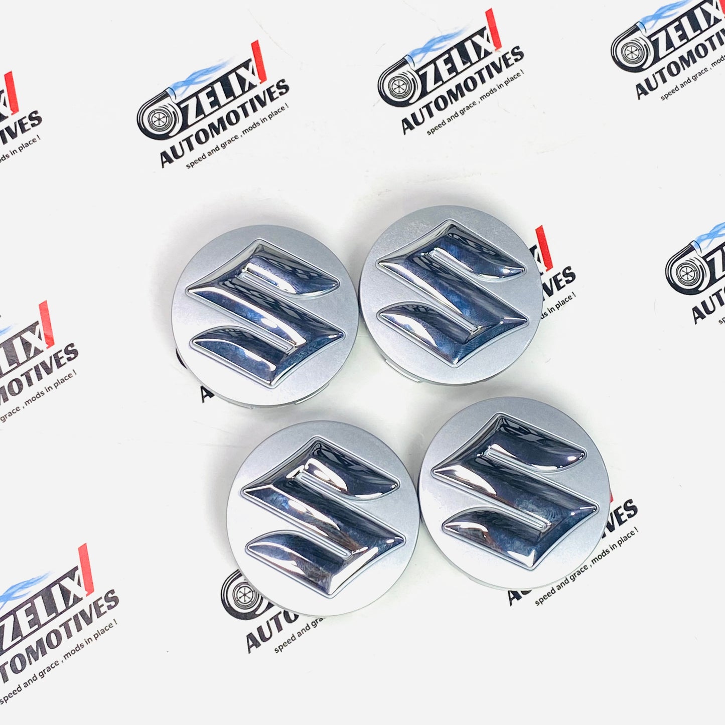 Aftermarket  Suzuki wheel center caps in Silver color 