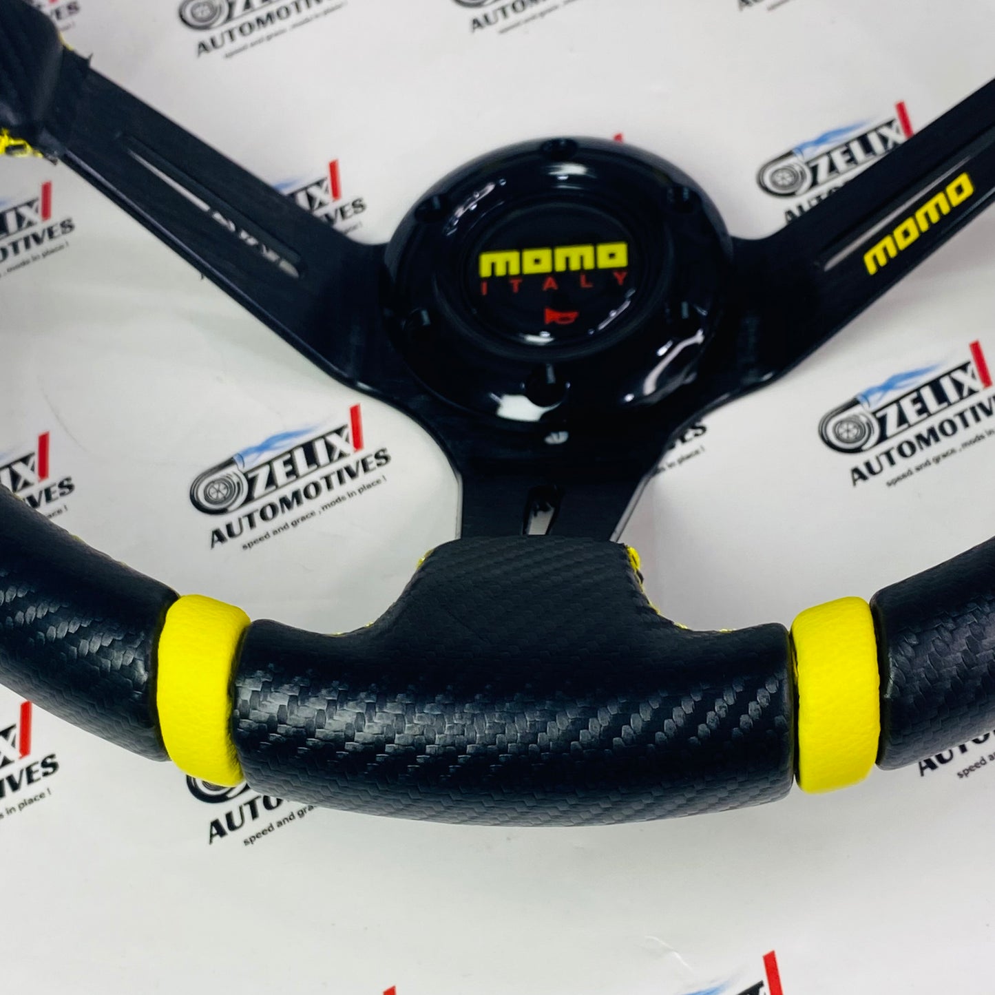 carbon fiber grip with yellow colored stitching