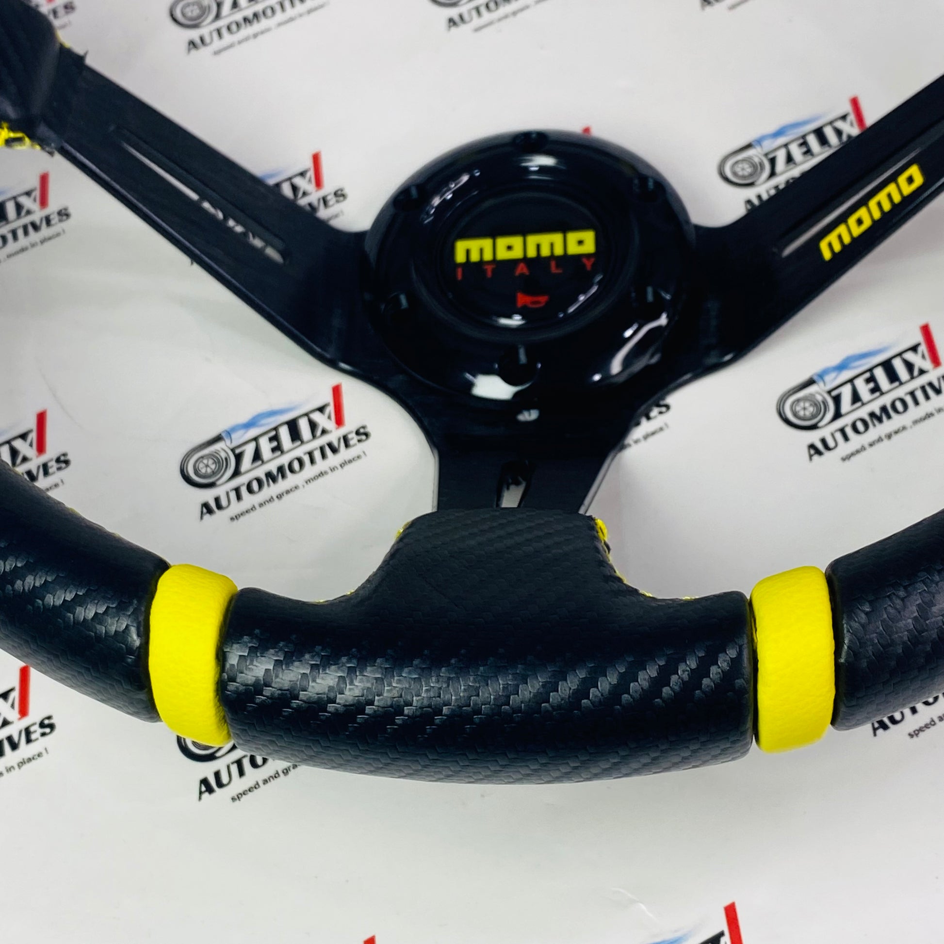 carbon fiber grip with yellow colored stitching