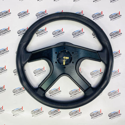  MOMO aftermarket racing steering wheel with sport-inspired look