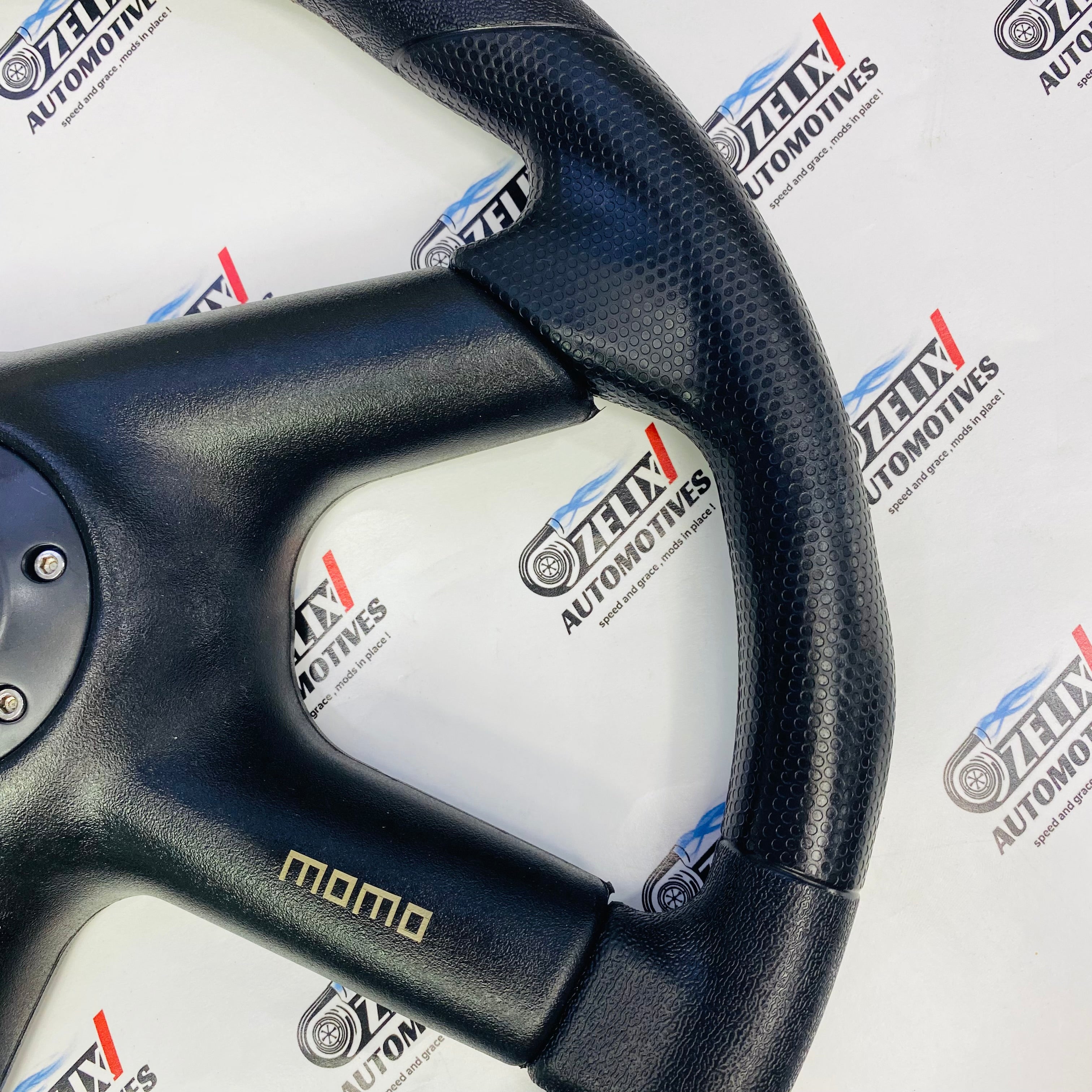 MOMO 4-Spoke Black Leather Universal Racing Steering Wheel