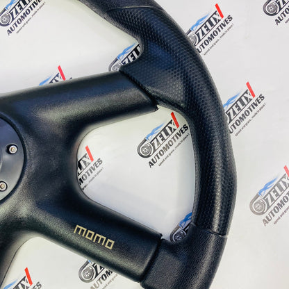 MOMO 4-spoke steering wheel with stitching and premium finish