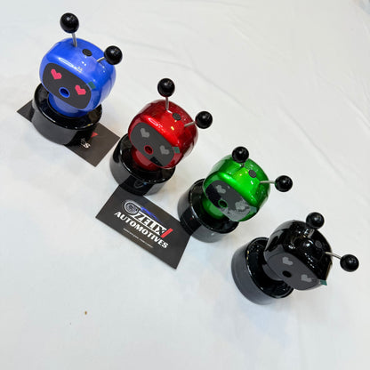 Universal Robot-style car dashboard perfume 