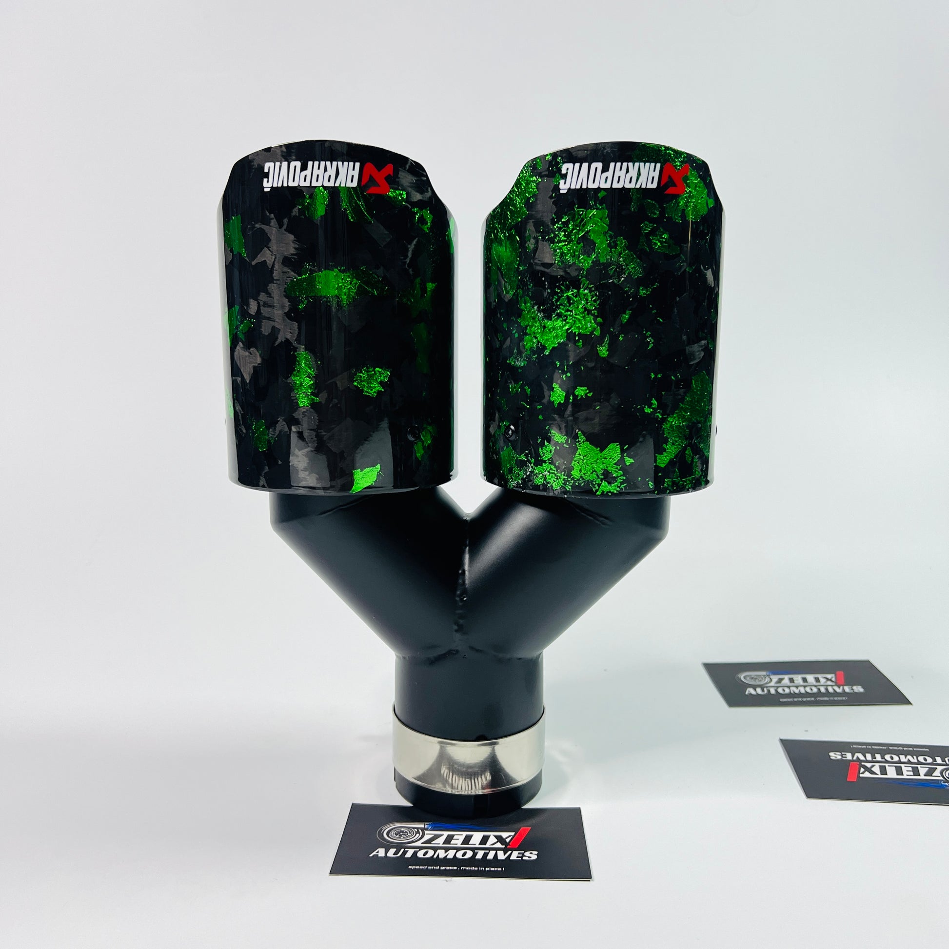 Close-up detailing the green forged carbon flakes and glossy clear coat