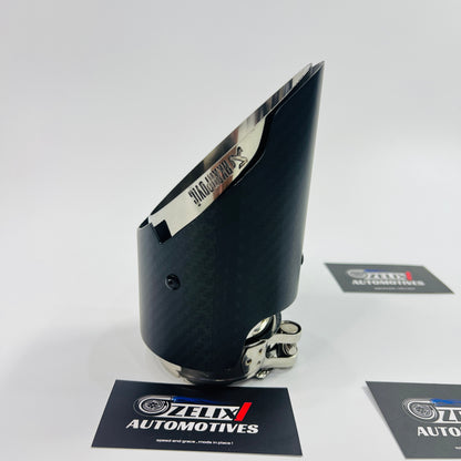 Side profile of the matte carbon single tip showcasing the textured wrap and aggressive slant-cut design