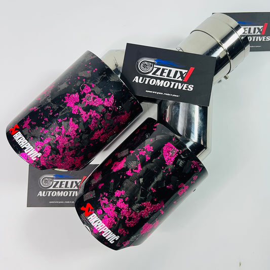 Akrapovic pink forged carbon dual exhaust tip displayed from front angle