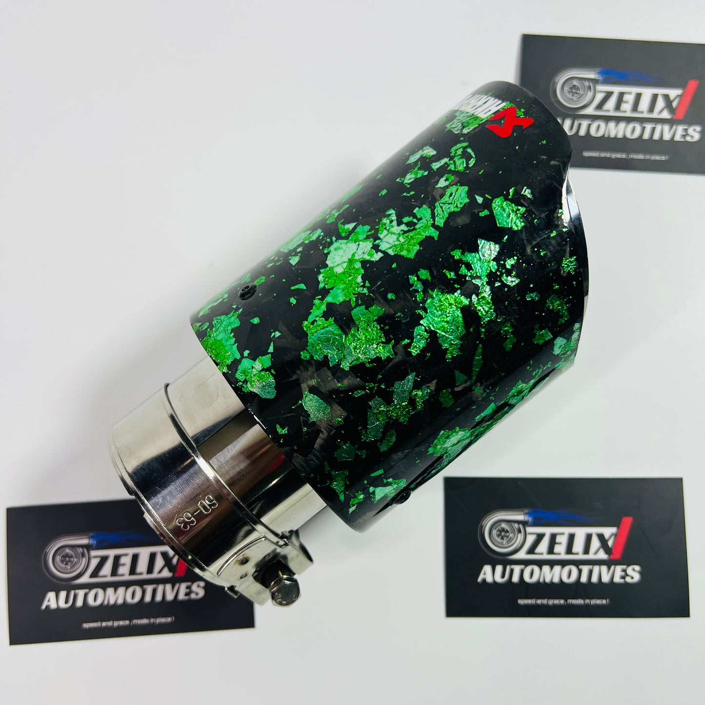Top-down view emphasizing the oval aperture and high-gloss green finish