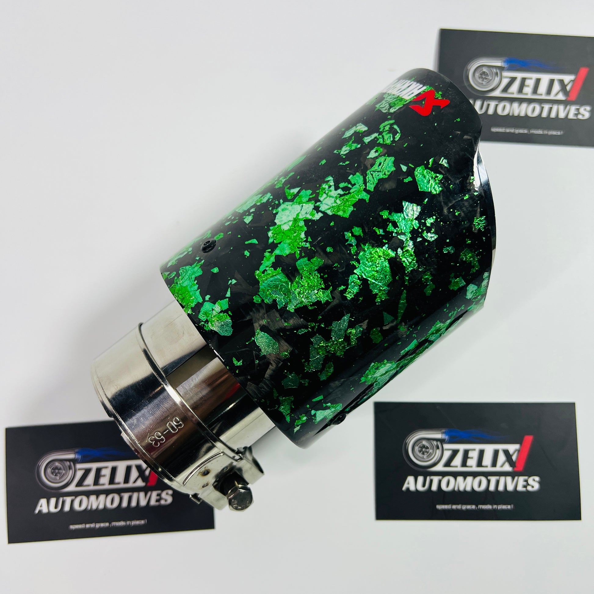 Top-down view emphasizing the oval aperture and high-gloss green finish