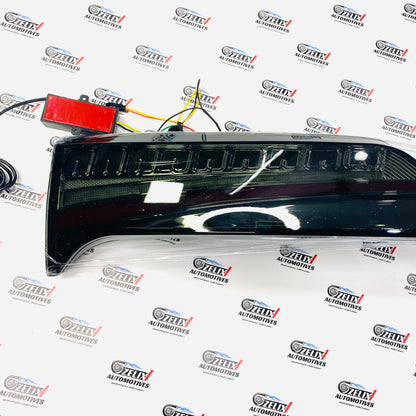 Fortuner aftermarket tail lamps in smoke and red finish for 2016 models 