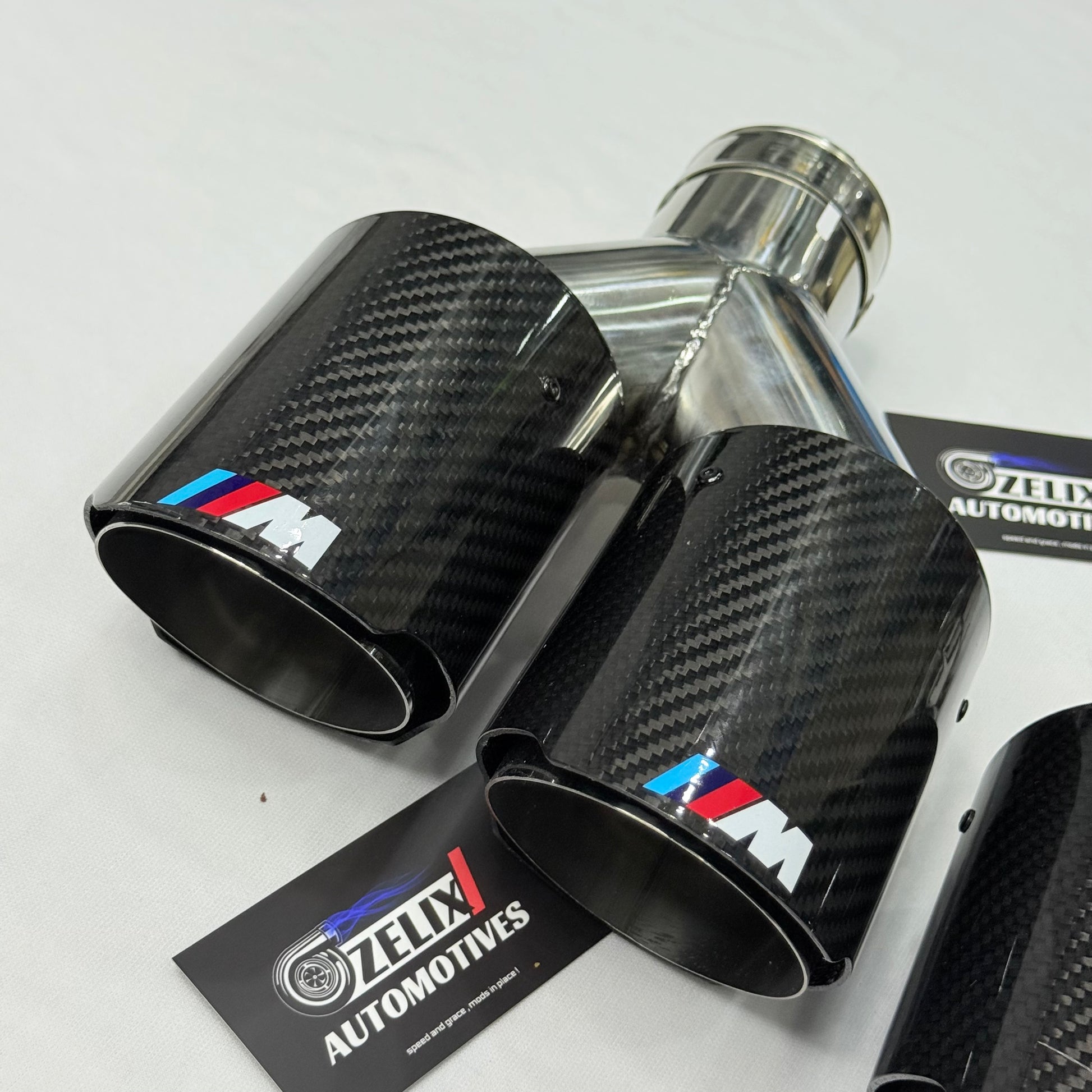 Side profile of BMW M Performance dual-tip carbon fiber exhaust with stainless core