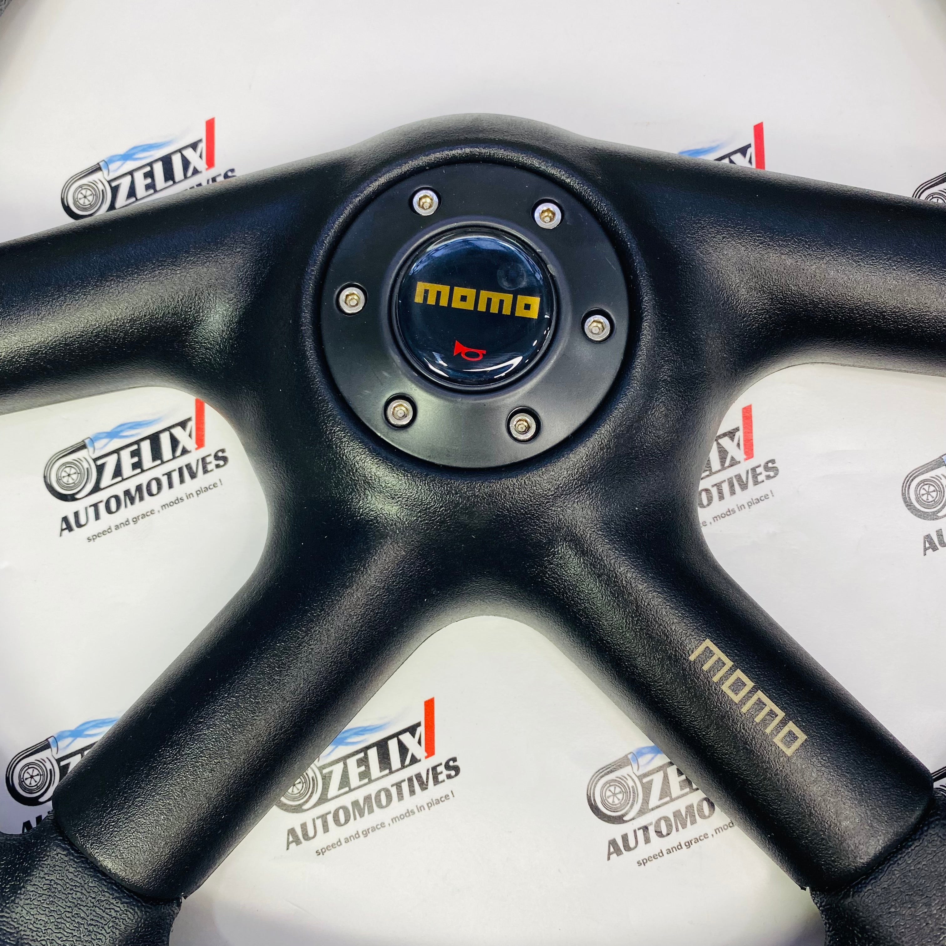 MOMO 4-Spoke Black Leather Universal Racing Steering Wheel