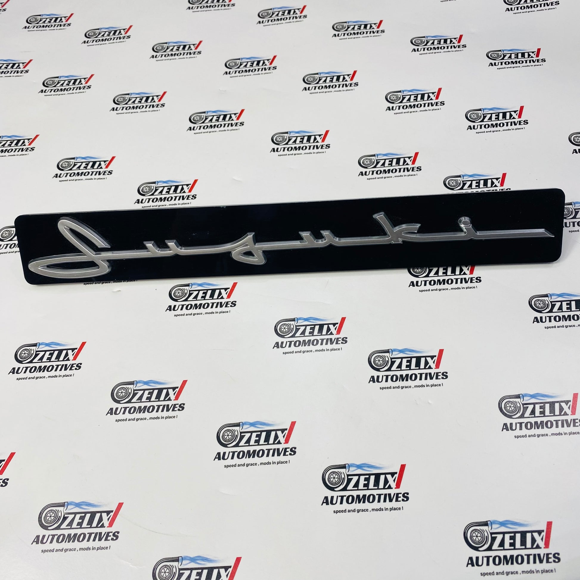 premium style front grille with cursive logo design 