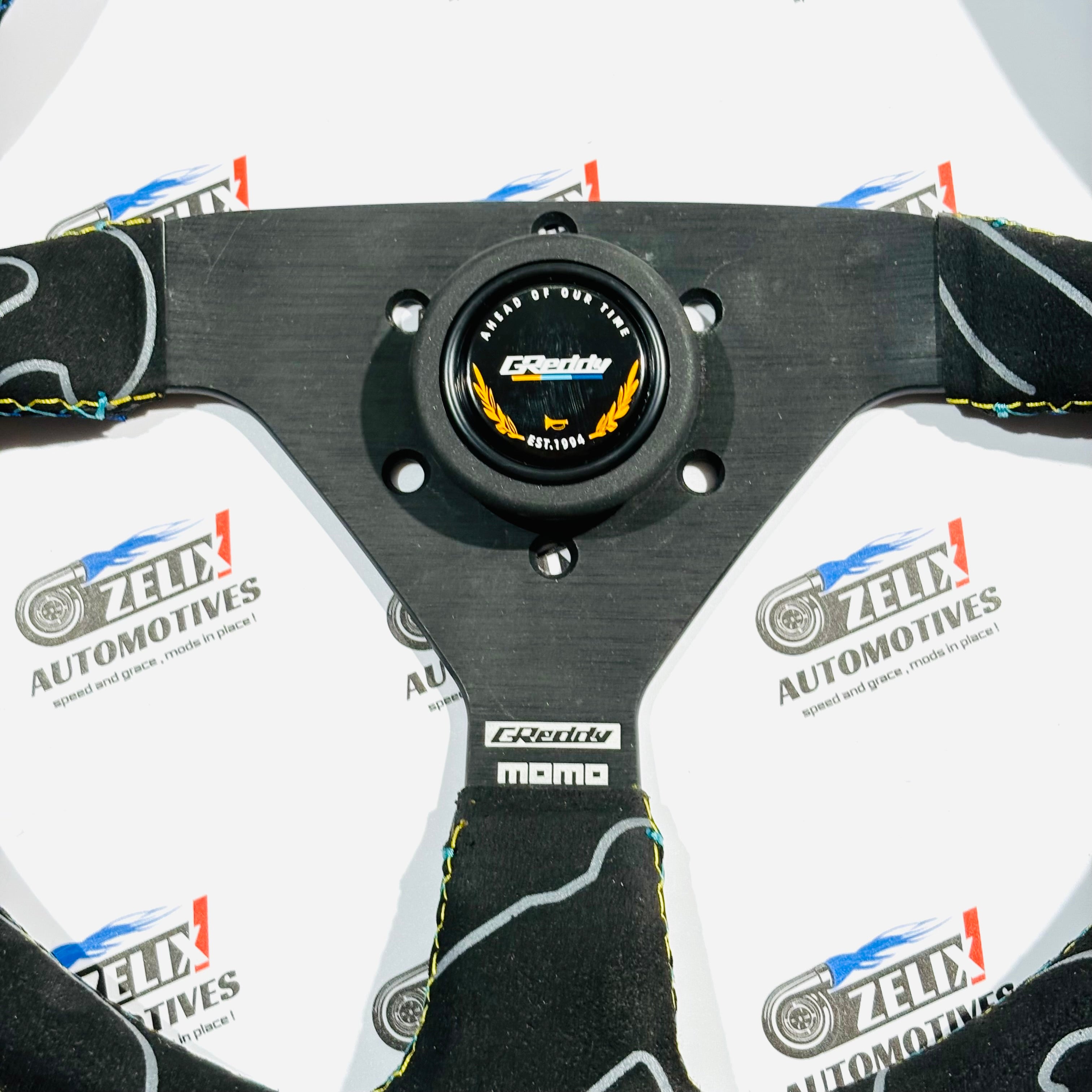 Momo × Greddy Collab Steering Wheel | Performance Racing Design