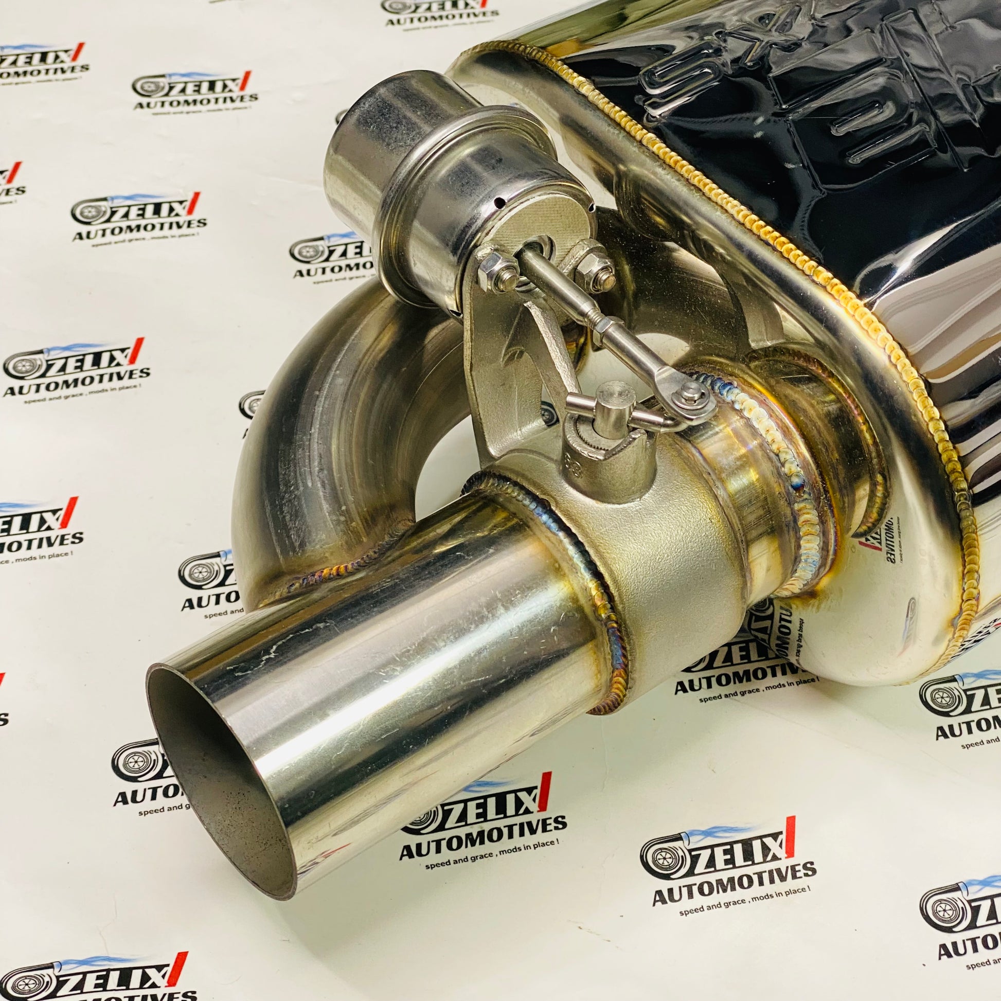 Aftermarket Borla single tip exhaust with side inlet