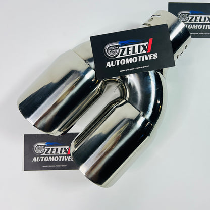 Dual round dual-exit stainless steel exhaust tip displayed from the front