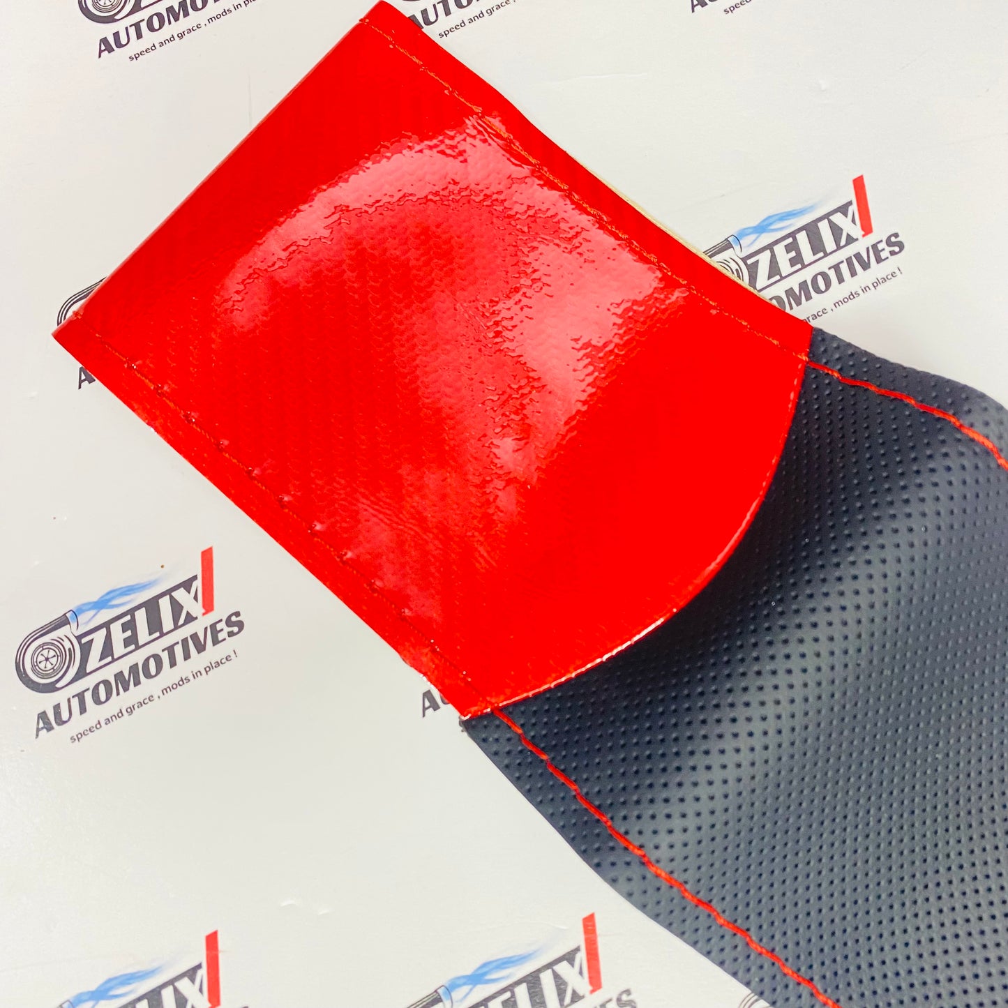 Faux Leather Anti-Slip Steering Cover | Universal Fit Black With Red Stitching